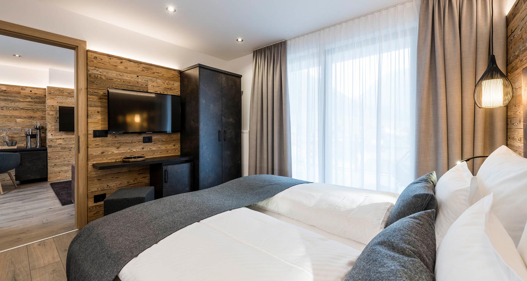 Bildergalerie - Suite Familien Penthouse - Ansicht von Bett auf TV - Matill